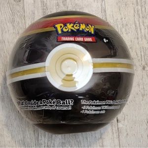 Black, Gold and Red Sealed Pokémon tin ball with 3 packs of trading cards 1 Coin